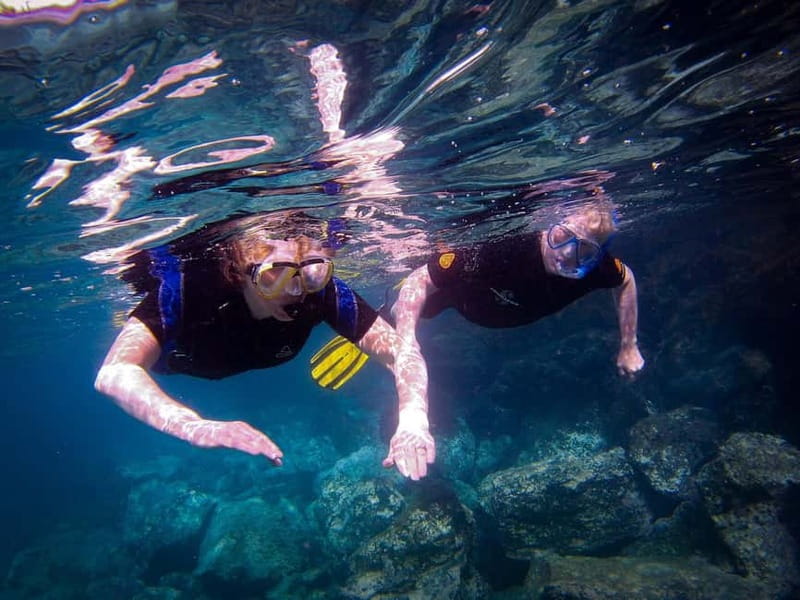 Costa Teguise: Snorkeling Tour with Instructor & Equipment - Snorkeling in a nearby bay: seeing Atlantic sea life up close