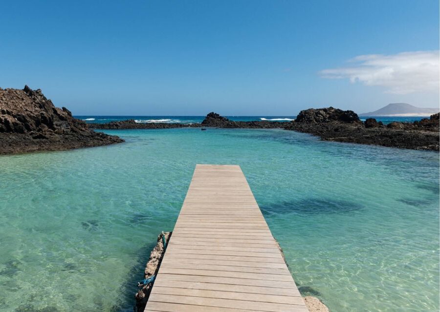 From Lanzarote: Lobos Island and Fuerteventura Day Cruise - Puertito de Isla de Lobos: lagoons, fishing village, and photos