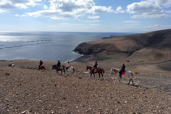 Horseback Riding in the sunset of Famara Beach, Lanzarote, Spain - Teguise Volcano Views: The Sunset Turn You’ll Remember