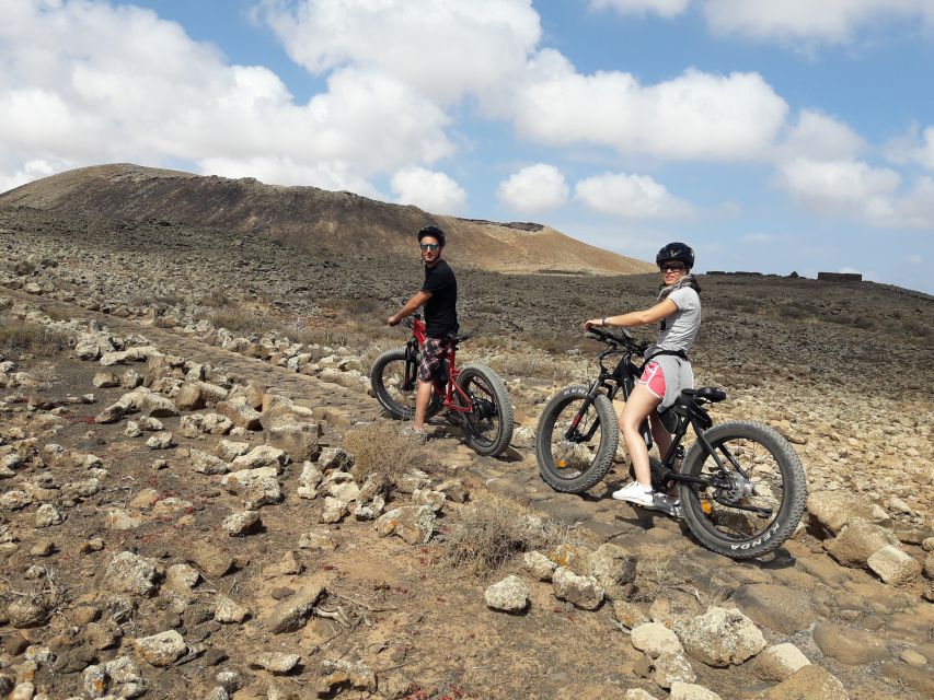 Lanzarote: Advanced 5-Hour Fuerteventura E-Bike Tour - A Boat Ride Then 45 km of Mostly Off-Road E-Bike Country