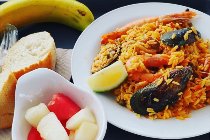 Lanzarote: La Graciosa island cruise with lunch and water activities - Food and drinks onboard: paella, sangria, and a party-friendly vibe