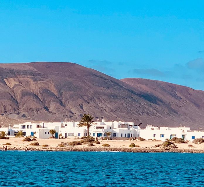 Lanzarote: Return Ferry to La Graciosa with Bus Pickup - La Graciosa feels calmer than you expect from Lanzarote