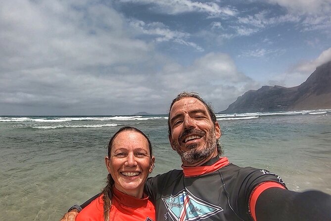 Longboard Private Surf Lessons in Caleta de Famara Spain - Gear included: The hidden value of wetsuit and longboard