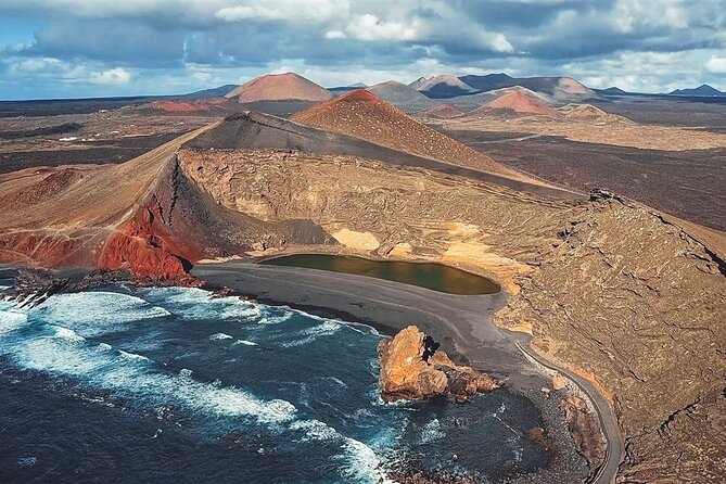 Tour to Timanfaya, La Geria and La Laguna Verde - La Geria Vineyards and the Free Wine Shot