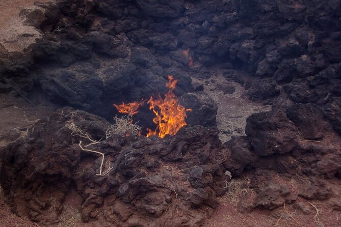 Tour to Timanfaya, La Geria and La Laguna Verde - Timanfaya National Park: Geothermal Demonstrations and the Road to the Red Craters