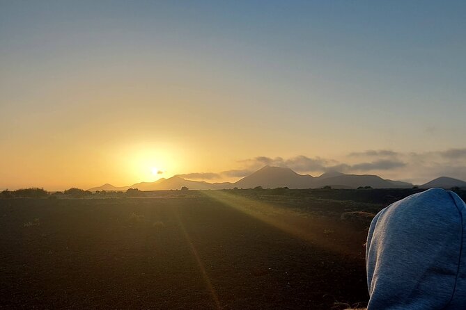 Trekking in the Volcanoes Natural Park in a small group - What to Pack: Shoes, Heat, and Water