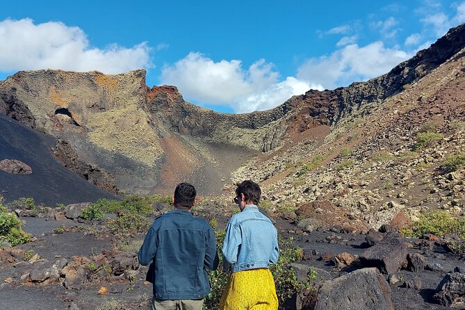 Trekking in the Volcanoes Natural Park in a small group - Stop by Stop: From Lava Fields to a Crater Moment